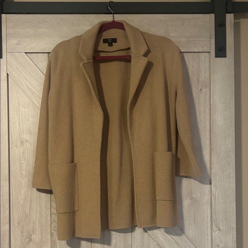 J Crew 35.5% Wool.
Dry clean only.